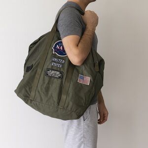 NASA green nylon patch bowler bag crossbody strap Red Canoe Canada helmet bag